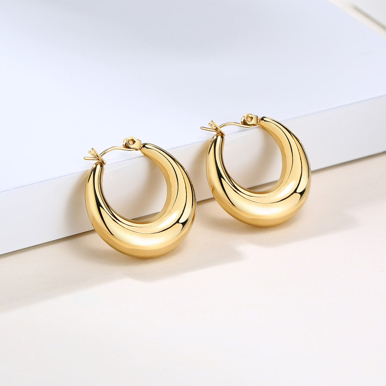 Julia gold chunky crescent dome hoop earrings