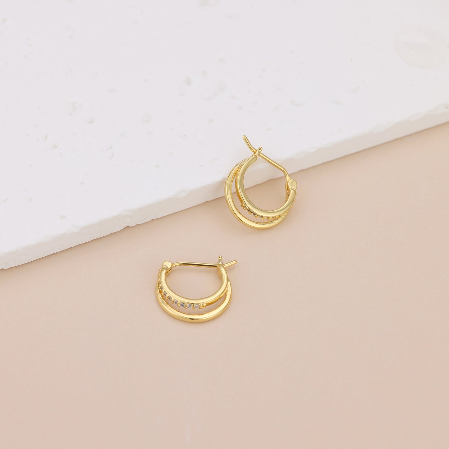 E072 paved double huggie hoop earrings