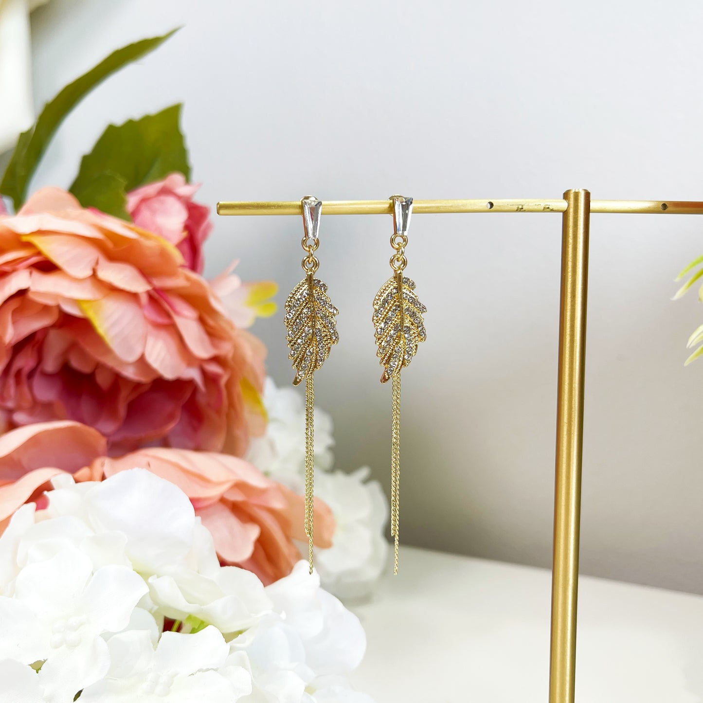 Alaina gold crystal paved leaf dangle earrings sale