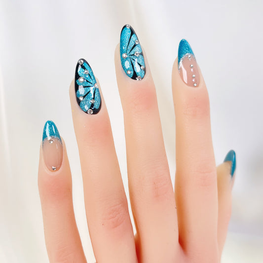 Blue cateye butterfly rhinestone almond press on nails