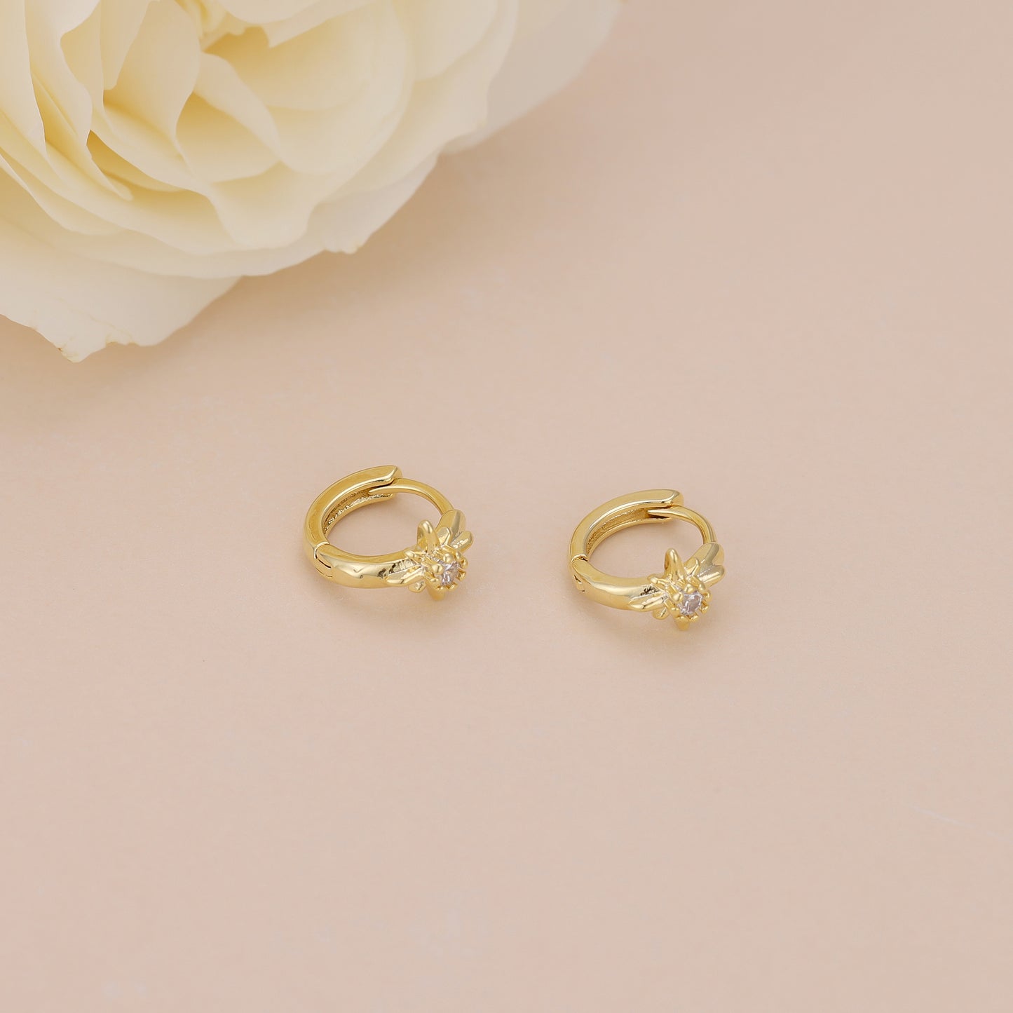 E168 celestial dainty starburst huggie earrings