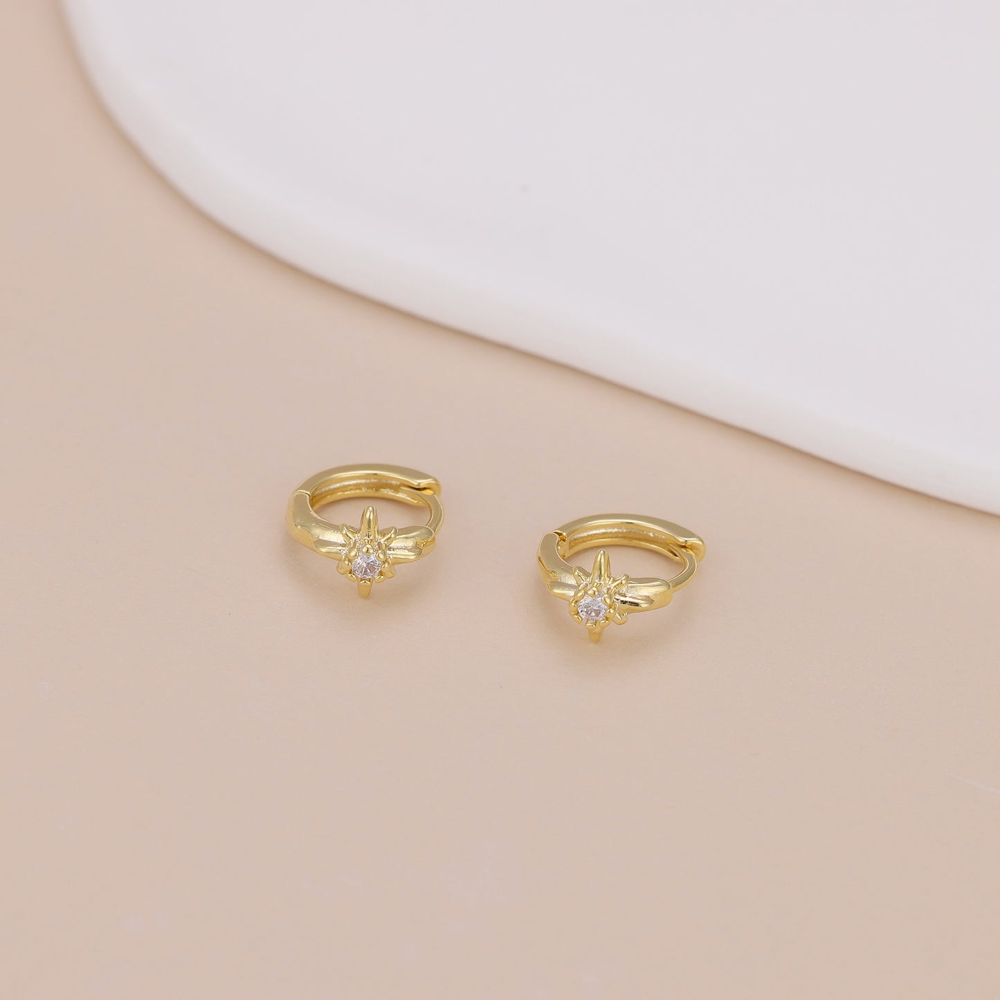 E168 celestial dainty starburst huggie earrings