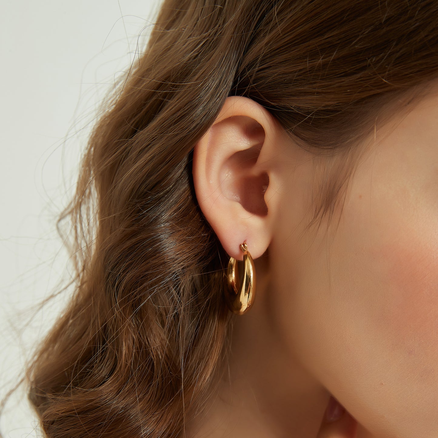 Julia gold chunky crescent dome hoop earrings