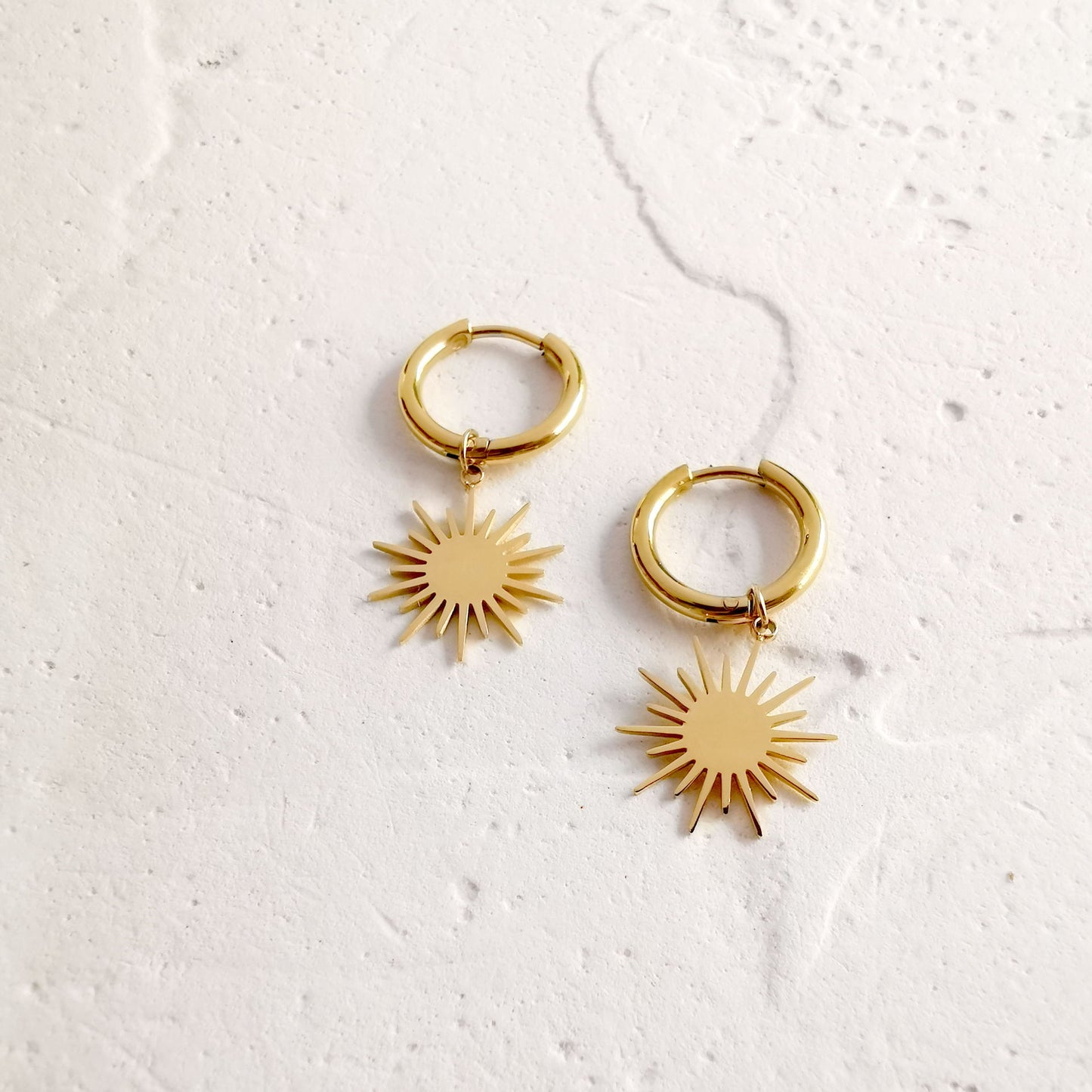 Reagan starburst dangle huggie earrings