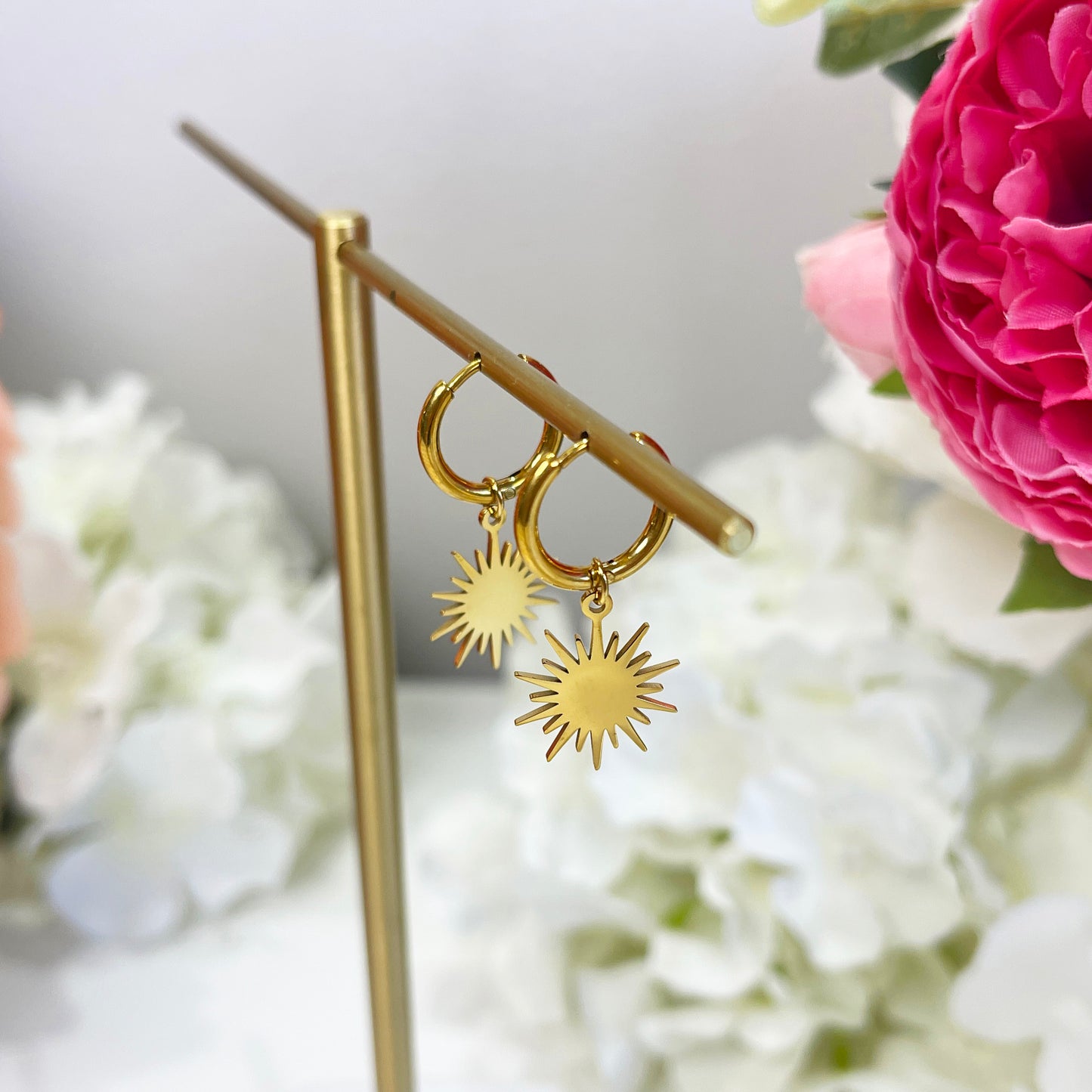 Reagan starburst dangle huggie earrings