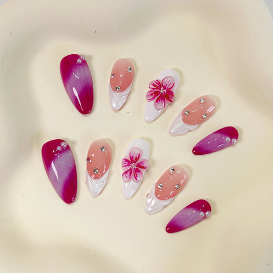 Fuchsia pink flower & french tip aurora almond press on nails