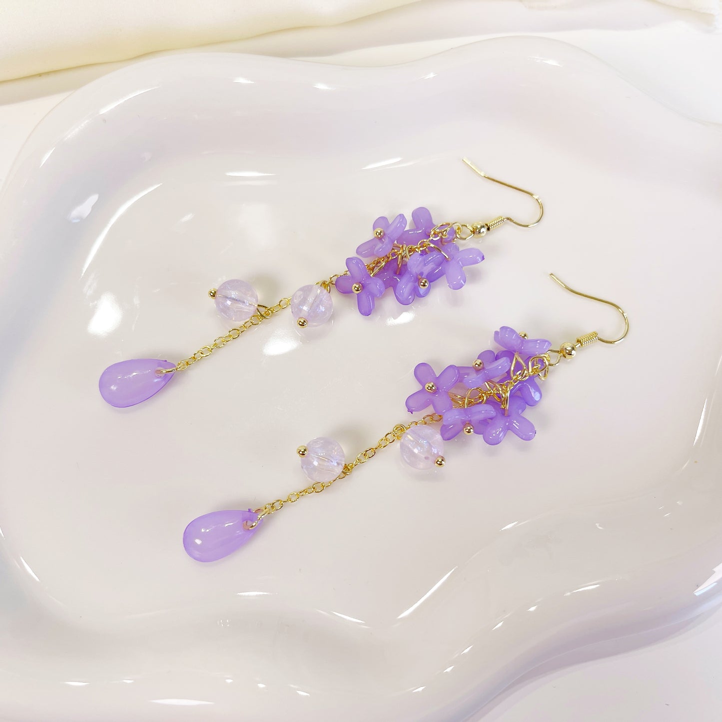 E195 purple lily flower long dangle earrings