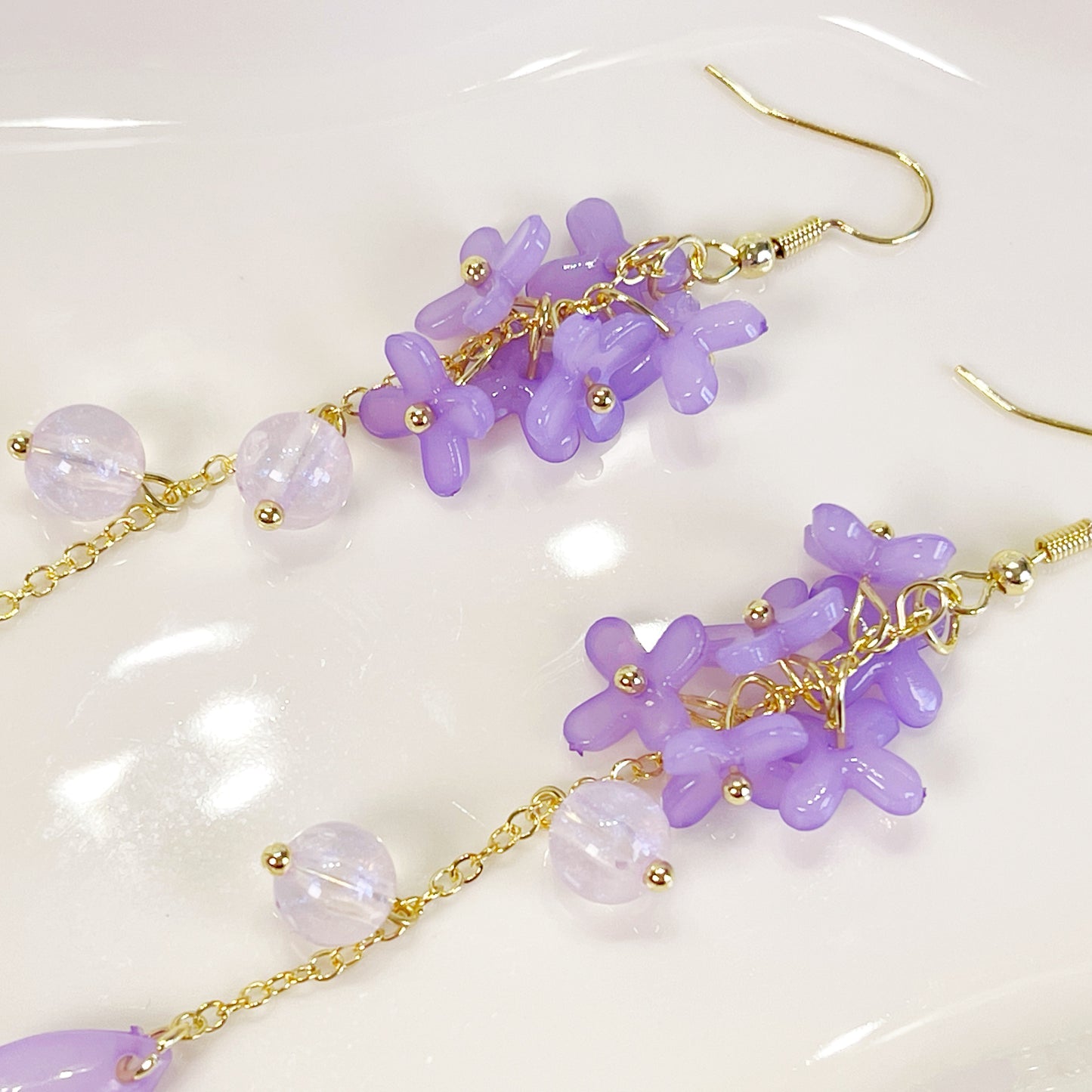 E195 purple lily flower long dangle earrings