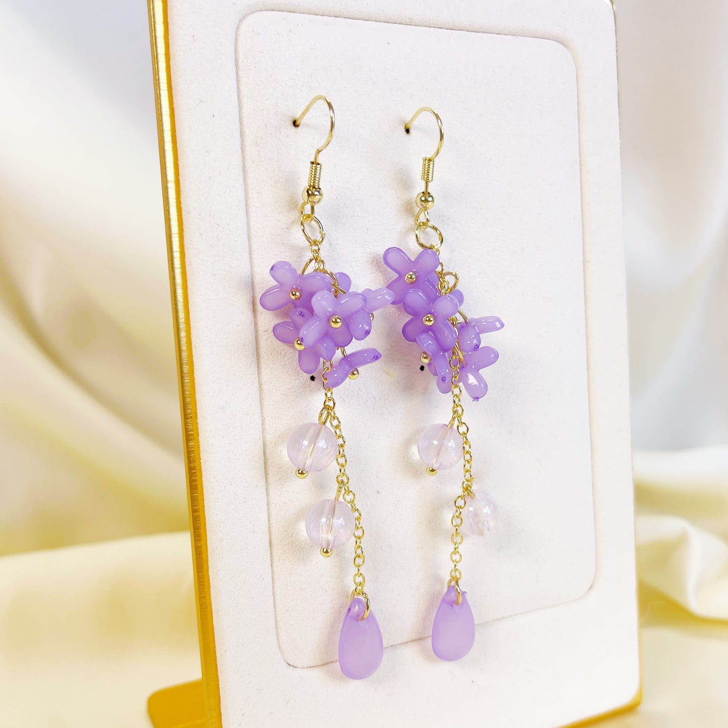 E195 purple lily flower long dangle earrings