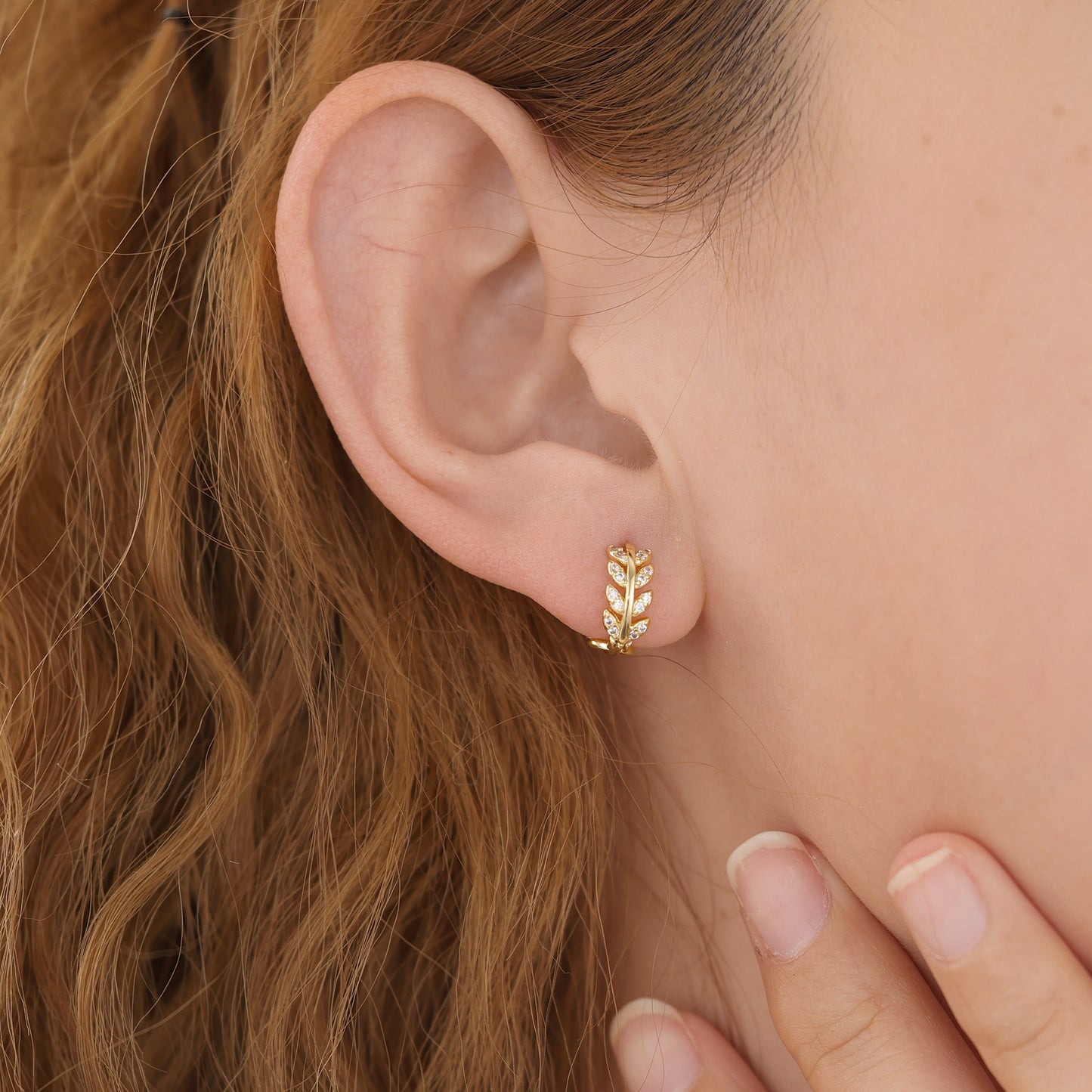 E043 gold leaf huggie hoop earrings