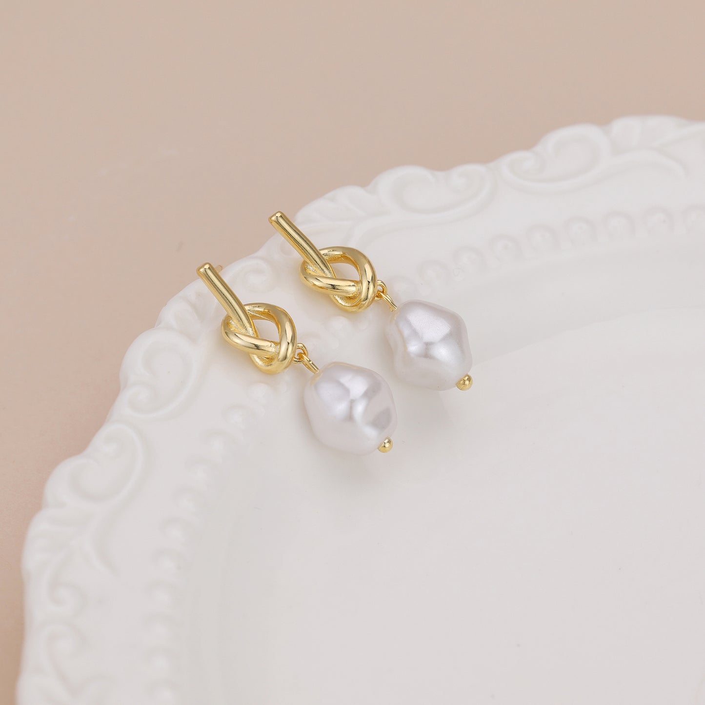 E161 love knot pearl dangle stud earrings