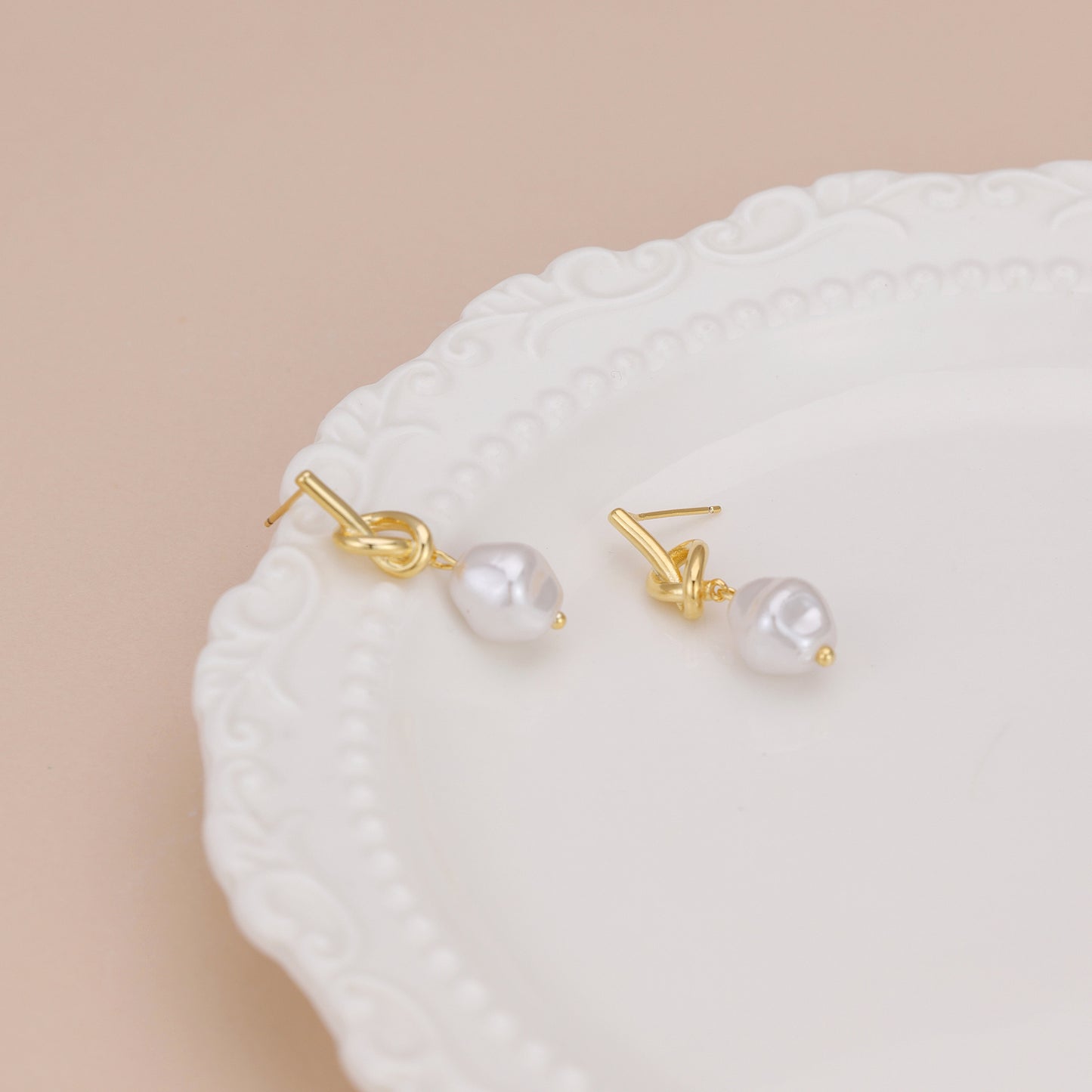 E161 love knot pearl dangle stud earrings