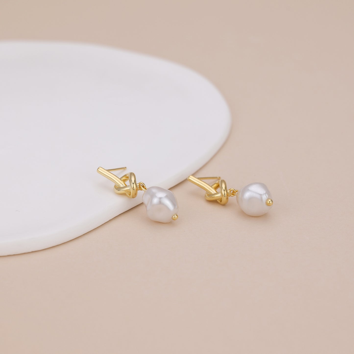 E161 love knot pearl dangle stud earrings