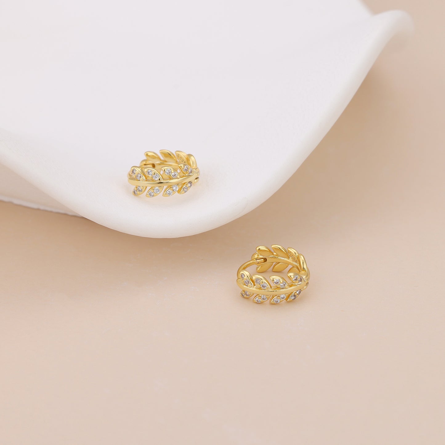 E043 gold leaf huggie hoop earrings