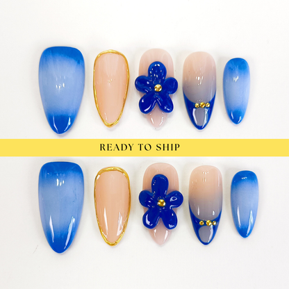 Blue aurora ombre with gold chrome flower almond press on nails - RTS