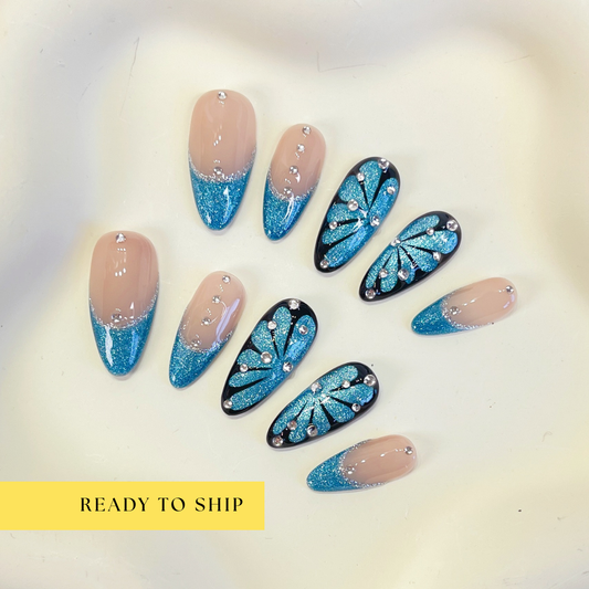 Blue cateye butterfly rhinestone almond press on nails
